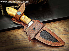 Custom Handmade Damascus steel knife with unique fire pattern, stainless steel finger guard, olive wood handle, and genuine cowhide leather sheath. Overall length 9 inches.