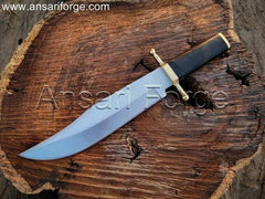 Hand-forged Smithsonian Bowie Knife with 5160 steel clip point blade, brass guard, buffalo horn handle, and leather sheath. Overall length 16 inches.