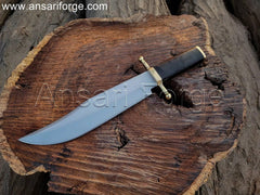 Hand-forged Smithsonian Bowie Knife with 5160 steel clip point blade, brass guard, buffalo horn handle, and leather sheath. Overall length 16 inches.