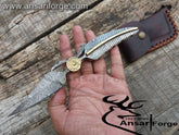 Handmade Damascus Pocket Knife displaying intricate twist pattern blade and Damascus steel handle.