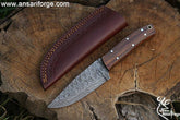 Handmade Damascus steel hunting deer skinning knife with leather sheath .