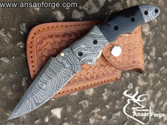 Damascus folding knife by Ansari Forge.