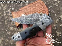 EDC Damascus pocket knife with stainless steel pocket clip.
