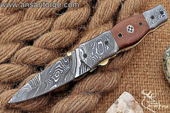Damascus steel pocket knife with leather pouch