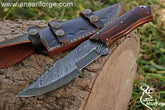 Damascus steel tracker hunting knife.Damascus steel 1095 & 15n20 hand forged twisted blade with 58 - 60 HRC hardness , Rosewood handle and comes with genuine cowhide leather sheath