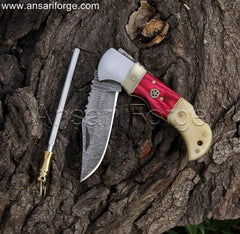 Damascus folding pocket knife with a twist pattern blade, camel bone handle, and cowhide leather sheath.