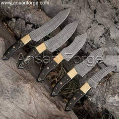 Pro Damascus Chef Knife Set featuring five beautifully crafted knives with Damascus steel blades and ergonomic buffalo horn handles, displayed in a luxurious leather roll bag.