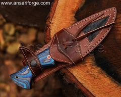 Handmade Damascus Hunting Knife sheathed in its premium real cowhide leather sheath.