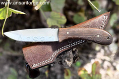 Durable and versatile hand forged bushcraft knife, perfect for outdoor adventures.