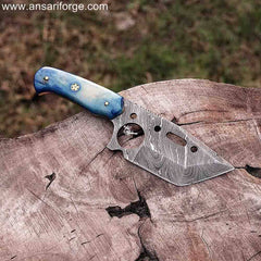 Honoo Damascus steel tanto blade with sharp point and layered pattern.
