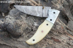 Sharp Eagle Damascus Pocket Knife: 1095 & 15N20 Damascus steel blade, camel bone handle, leather pouch.