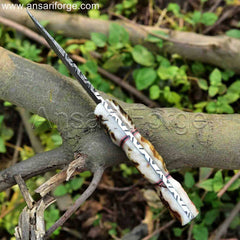 Beautiful Handmade Damascus Hunting Knife with Ram Horn Handle. Twist pattern Damascus steel blade for strength and beauty. Includes protective cowhide leather sheath.