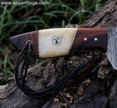 Hunter's Edge Damascus Skinning Knife - Camel bone and rosewood handle for a luxurious and secure grip.