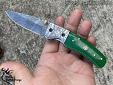 Damascus steel engraved pocket knife