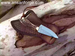 mirror polished drop point blade made from a recycled Farrier rasp blade.