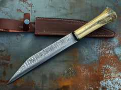 Viking Seax Knife with hand-forged Damascus steel blade and camel bone handle. Leather sheath included.