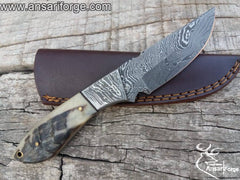 Damascus steel hunting knife ram horn handle and leather sheath
