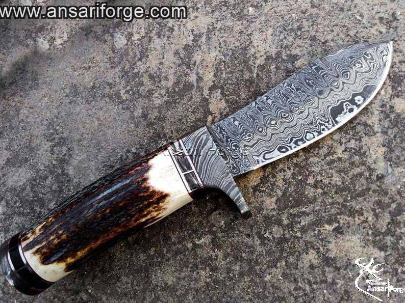 Handmade Damascus Steel Hunting Knife with stag handle.