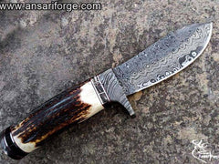 Handmade Damascus Steel Hunting Knife with stag handle.