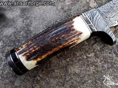 Stag antler handle & Damascus guard of Damascus steel hunting knife.