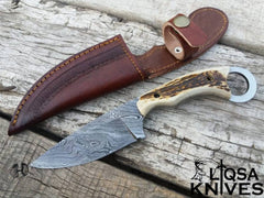 Best Fixed blade hunting knife Damascus blade and leather sheath.