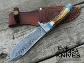 A Real Damascus Knife with a ladder pattern, deer antler handle, and turquoise stone liners.