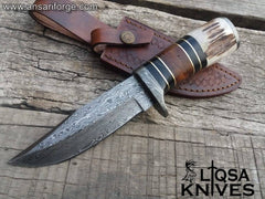 Custom made Damascus steel stag handle hunting knife.