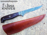 Damascus steel trout fillet knife with a twist pattern blade, resting on a wooden cutting board.