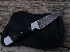 Damascus steel fixed blade skinner with bull horn handle