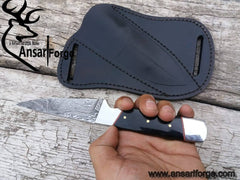 Damascus steel fixed blade skinner with bull horn handle