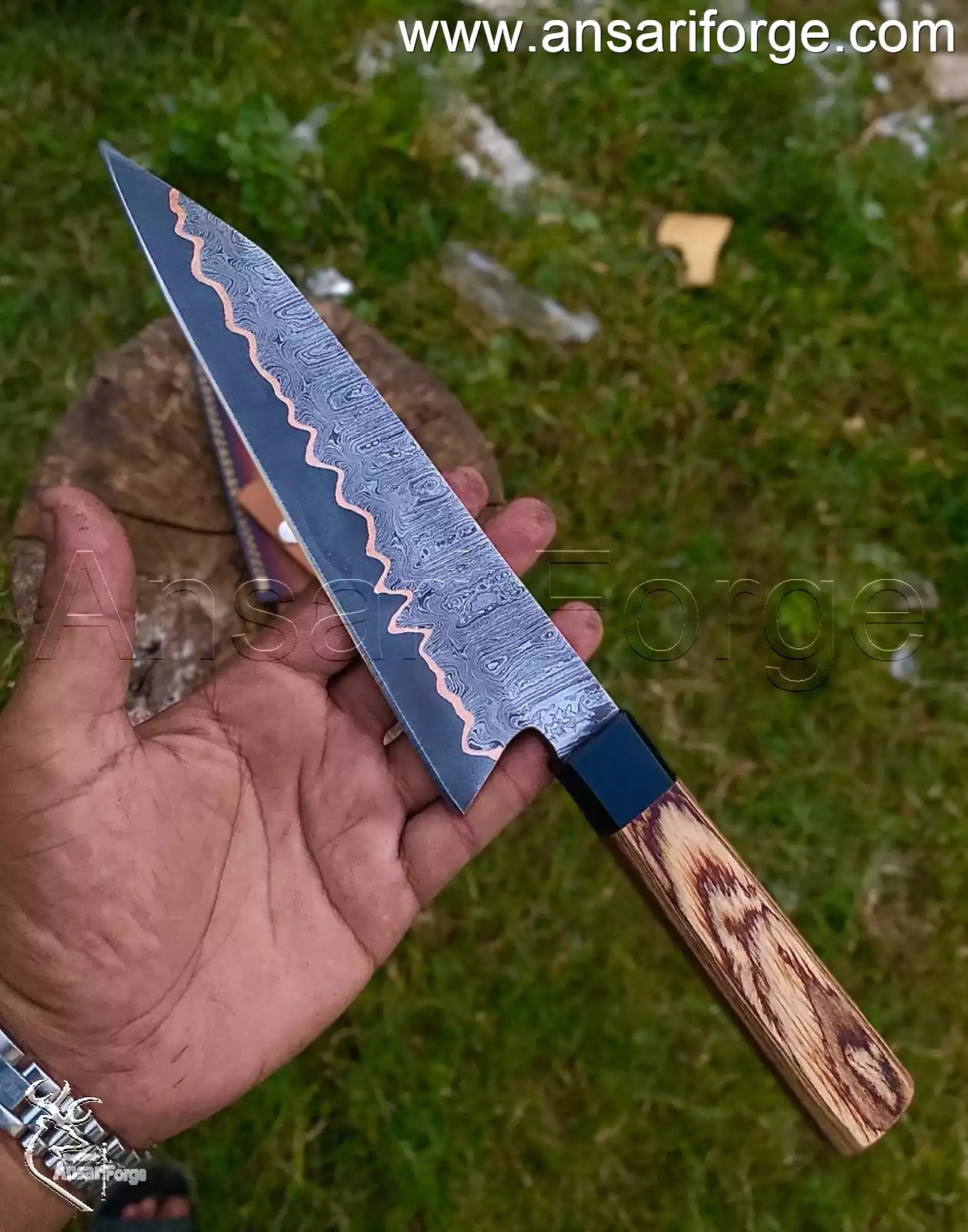 Hand forged Copper Damascus Chef Knife 8 inch blade showing unique copper layers.