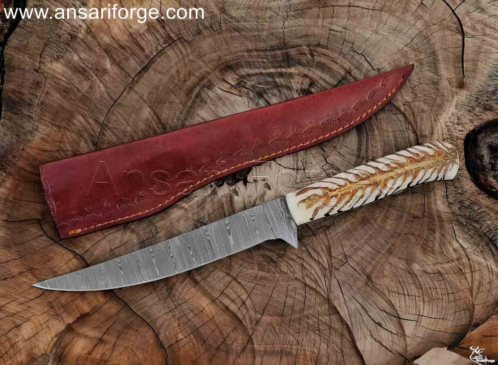 Hand-forged Damascus fillet knife with a beautiful twist pattern flexible blade.