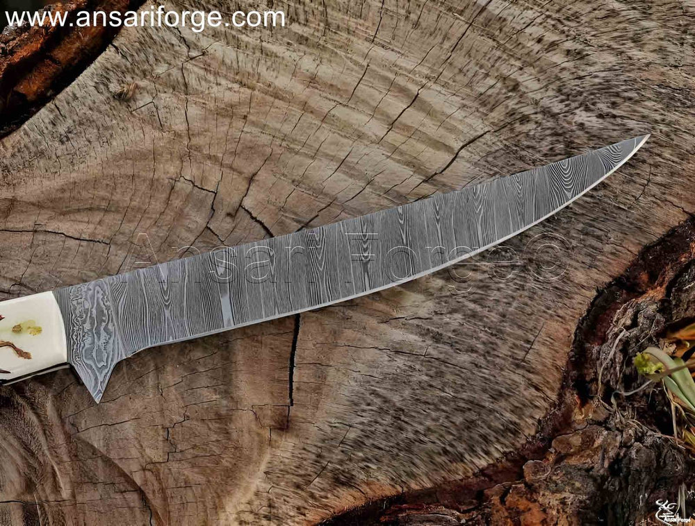 Flexible full tang blade of Damascus steel fillet knife.