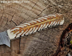Beautiful pine cone handle of handmade Damascus fillet knife.