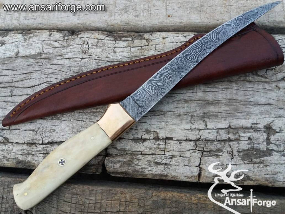 Damascus steel fillet knife with bone handle.