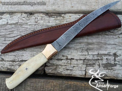 Damascus steel fillet knife with bone handle.