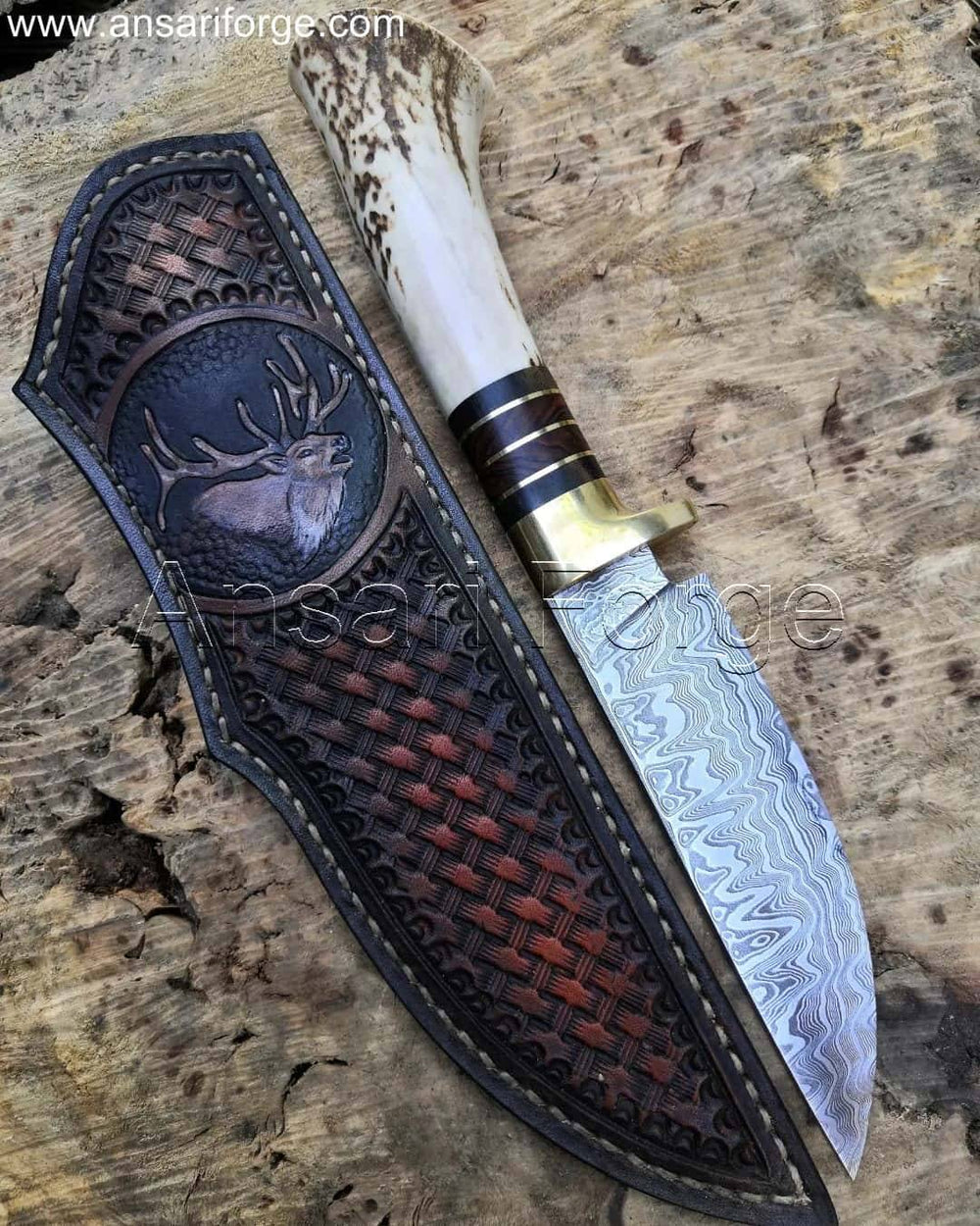 The Deer Hunter Handmade Damascus Hunting Knife with its beautiful watered steel Damascus blade pattern, Sambar stag antler handle, and brass guard.