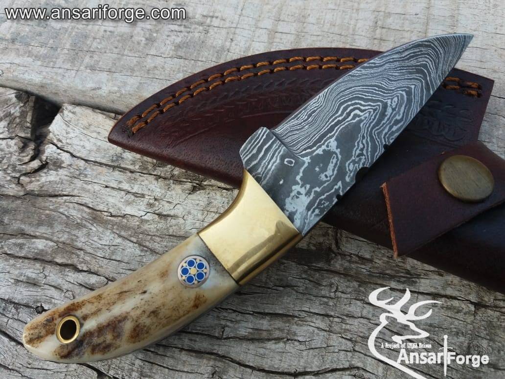 Real Damascus steel Every day carry knife, compact drop point blade & brass bolsters.