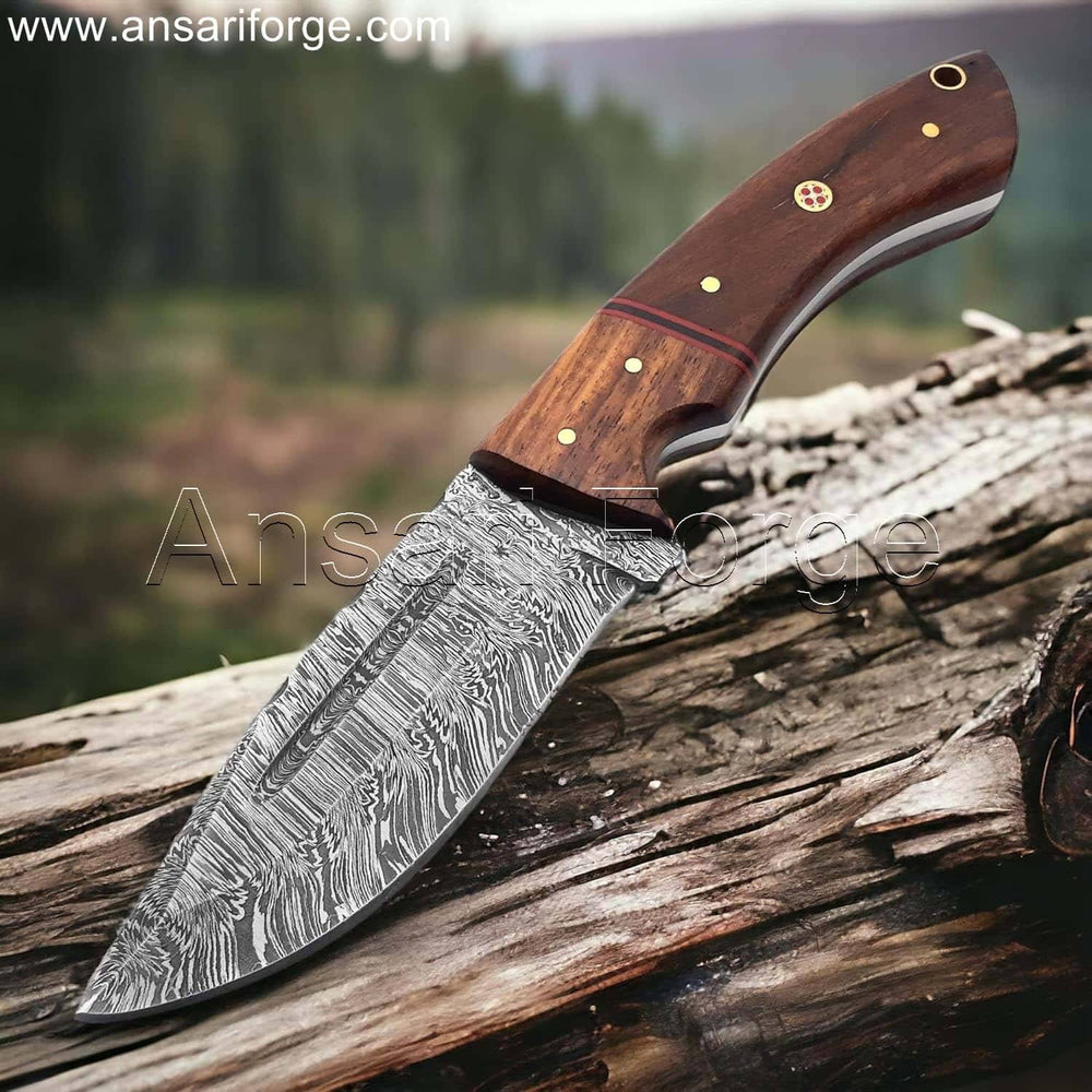 Close-up of Damascus Camping Knife blade showcasing the fire pattern.