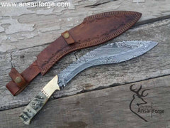 Damascus steel kukri knife with leather sheath.