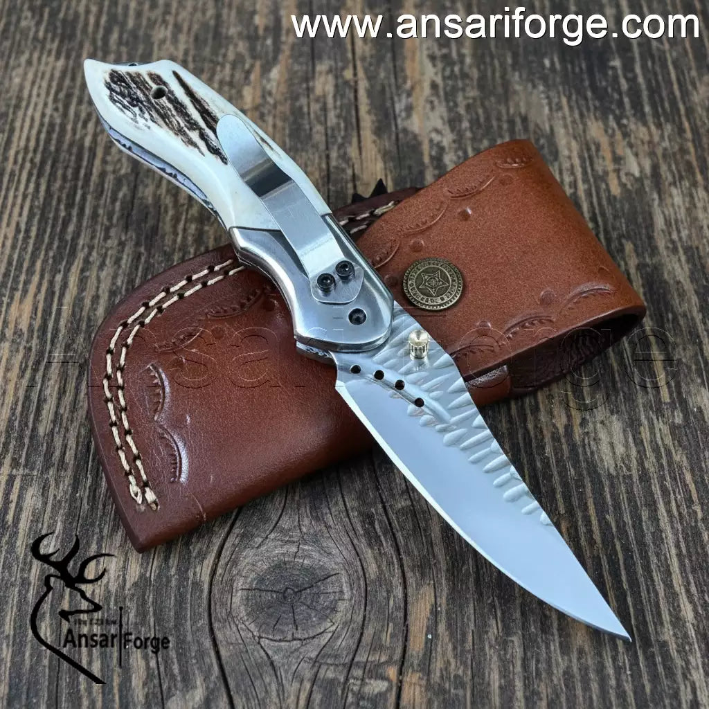 Mirror polished EDC folding knife blade close-up