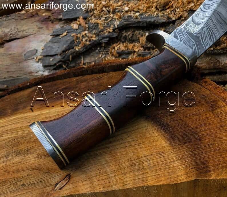 Kukri knife with Damascus steel blade and rosewood handle.