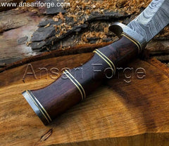 Kukri knife with Damascus steel blade and rosewood handle.