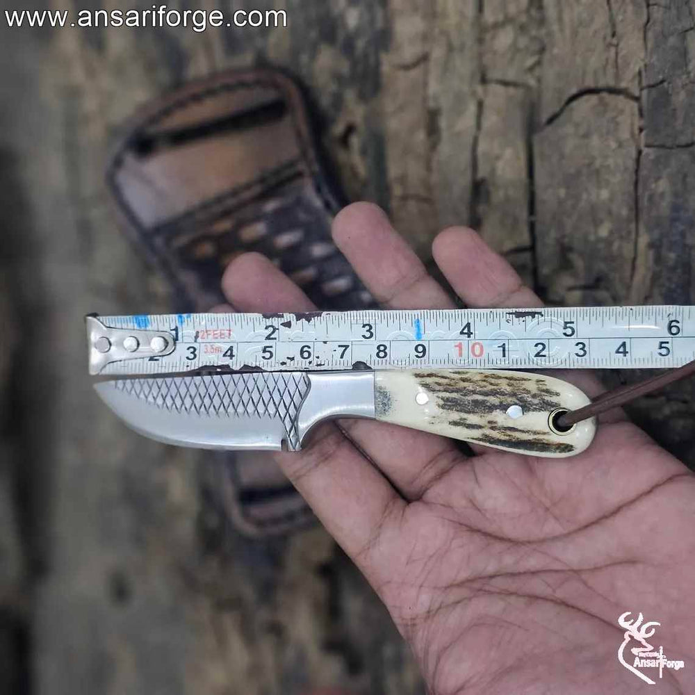 Western knife and sheath featuring a 2.5-inch blade and 3-inch handle.