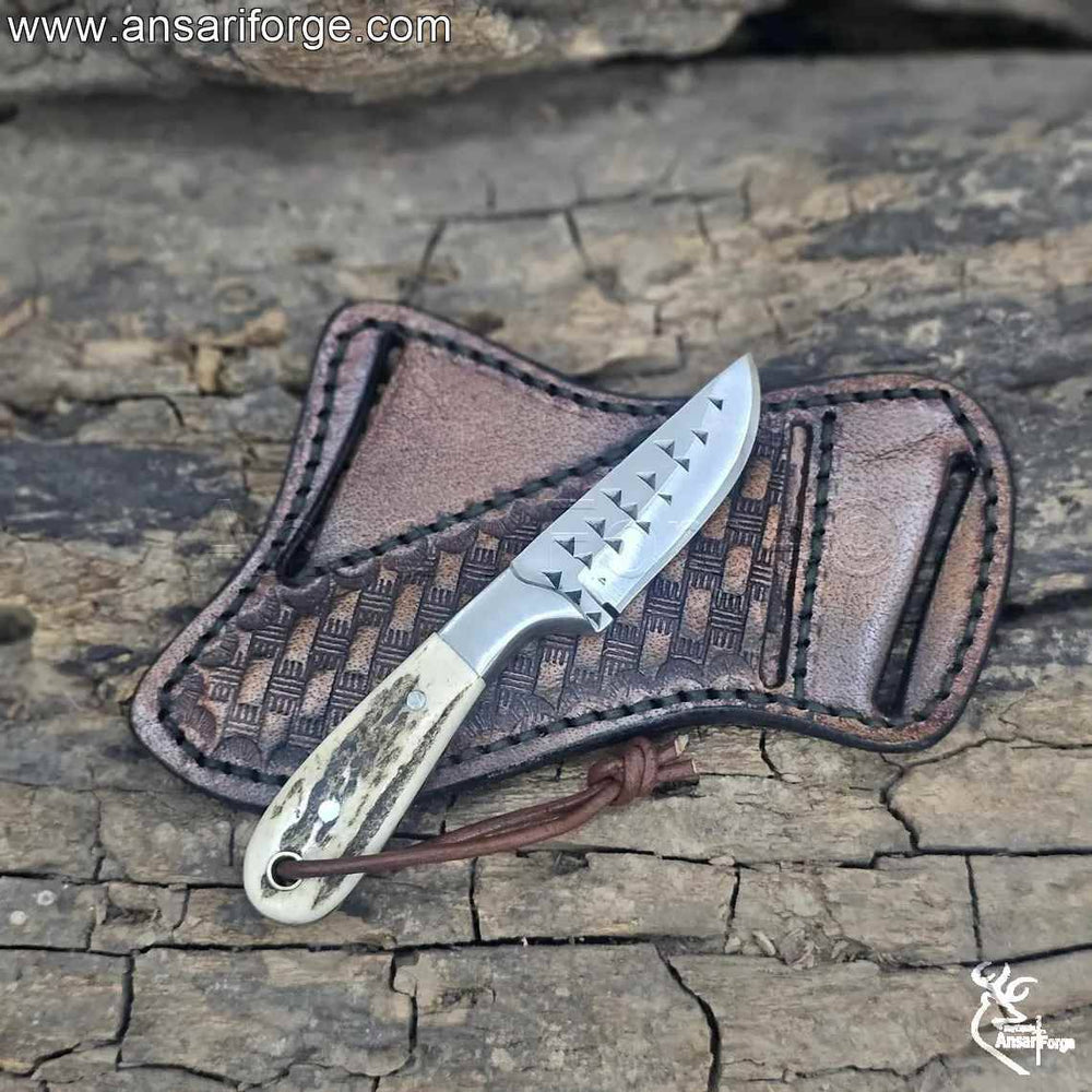 Close-up of Farrier rasp steel blade on cowboy knife and sheath.