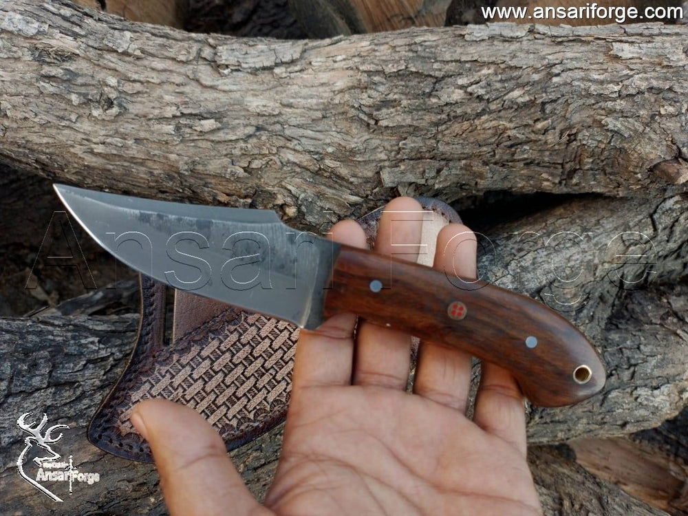 Traditional Cowboy Knife, hand-forged 5160 high carbon steel blade, rosewood handle, and leather sheath.