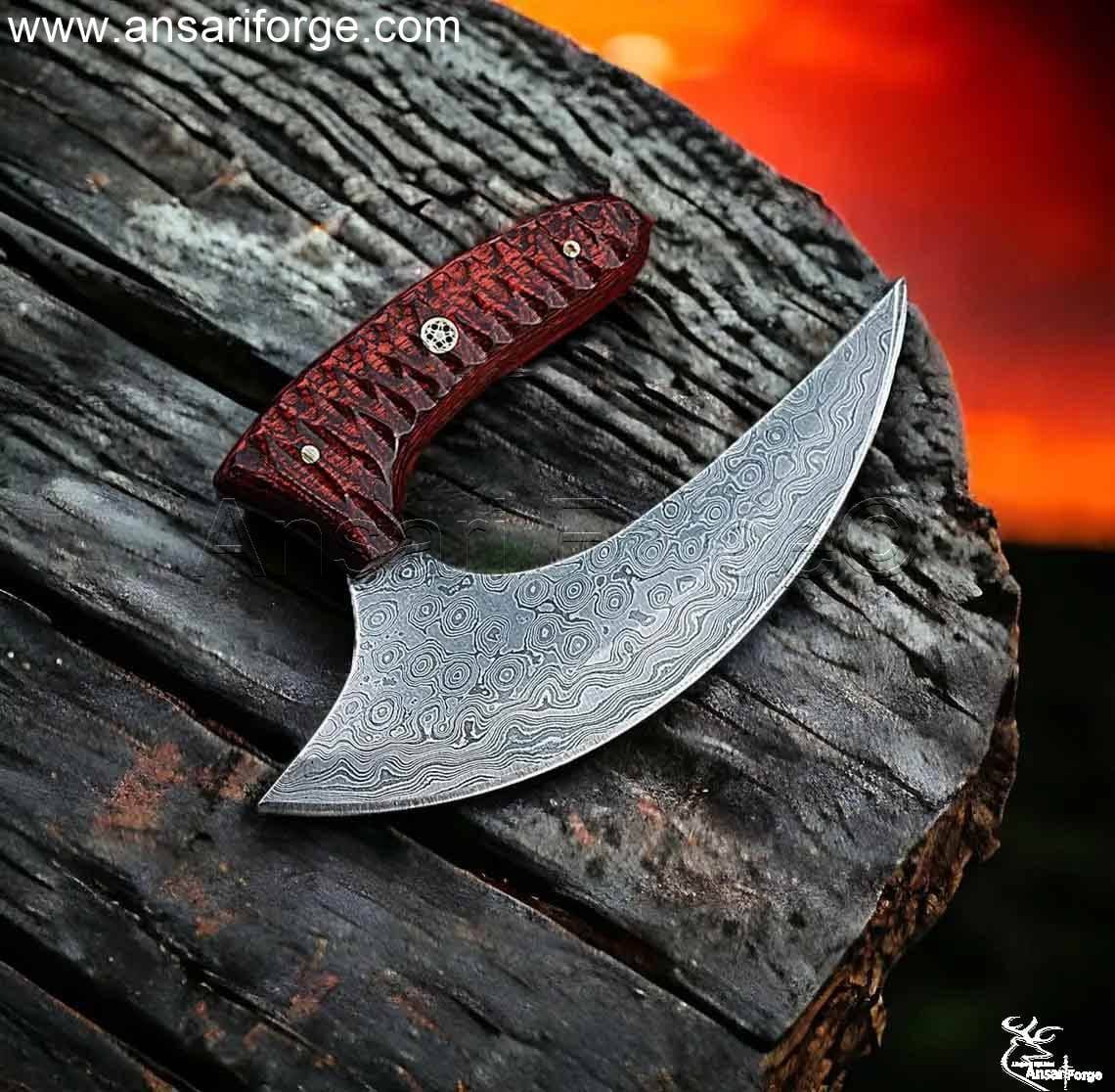 Hand-forged Damascus steel Ulu Knife with Pakka wood handle and leather sheath.