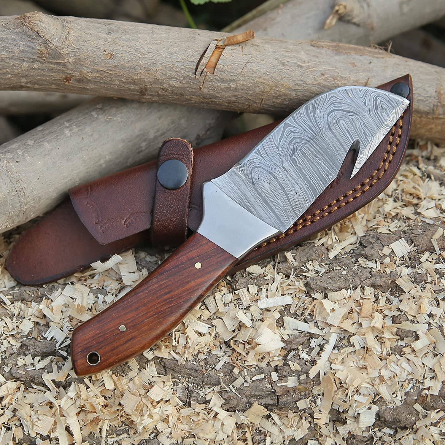 Rosewood handle of the hunting knife, featuring a comfortable grip and stainless steel bolsters for added durability.