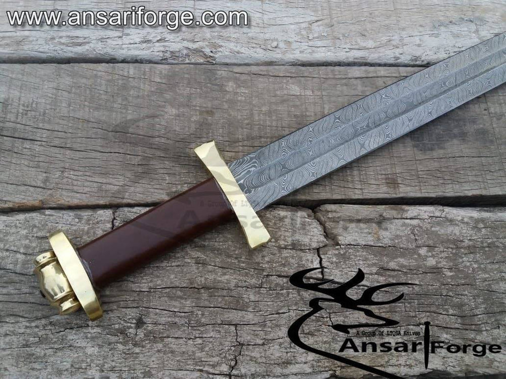 rass hilt and leather wrapped wooden handle of Damascus sword.