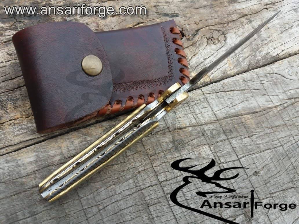 Handmade Damascus Pocket Knife open, featuring a secure liner lock mechanism for safe use.